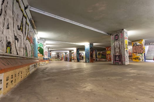 February 21, 2023 Lisbon, Portugal: graffiti painted on the walls of the underpass. Mid shot