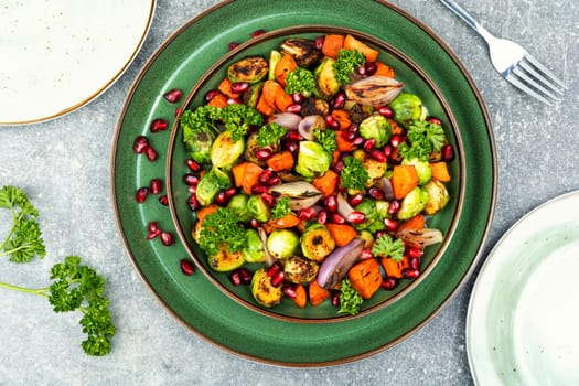 Warm salad with fried vegetables. Vegan food
