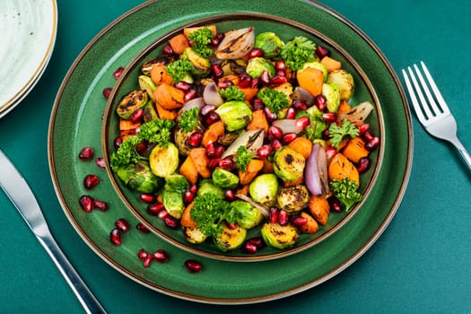 Warm salad with fried vegetables. Vegan food