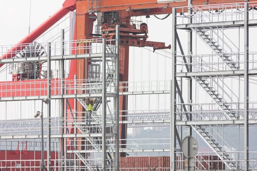 Construction site - the frame of the building under construction in cloudy weather. Mid shot