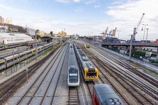 22 february 2023 Lisbon, Portugal: SIMEF Santa Apolonia - trains stand on the tracks at the railway depot. Aerial view