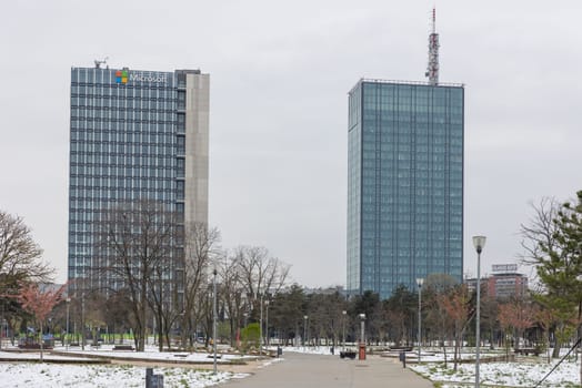 5 April 2023 Belgrade, Serbia: two office buildings, one of which is Microsoft Office. Mid shot