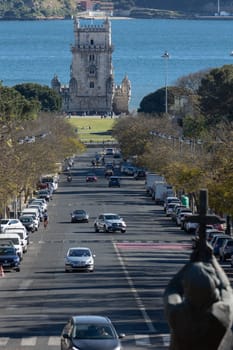 11 april 2023 - Lisbon, Portugal - Torre de Belem - Symbol of Lisbon - Perspective view from Jardim Ducla Soares. Vertical shot