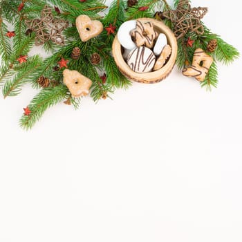 Nurnberg elisen gingerbread mix, traditional german christmas sweets with fir branches and pine cones, holiday background with copy space