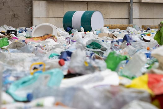 Landfill full of plastic garbage and other waste. Mid shot