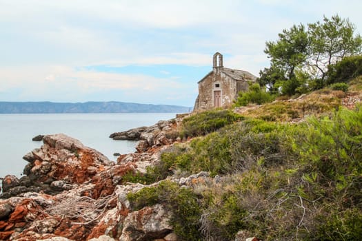 Beautiful little abandoned chapel at the coast of Hvar island, Croatia