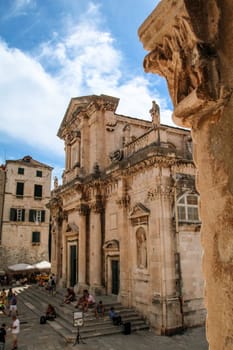 Portal of the baroque cathedral of Dubrovnik, seen through a window of the Rectors Palace, Croatia