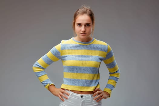portrait of very angry young woman with hands on hips. He's about to make serious decisions towards you. I would run away!
