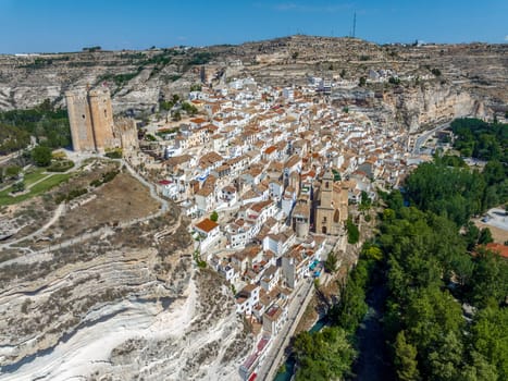 Side panoramic aerial view of Alcala del Jucar province of Albacete listed as beautiful villages of Spain