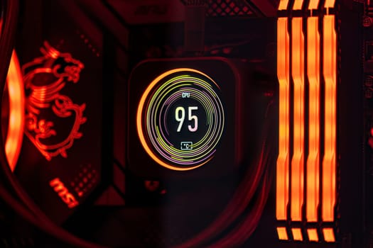 Milan, Italy 19 august 2023: A close-up of a CPU's liquid cooling system under high temperature inside a top-tier gaming computer.