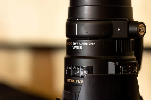 Milan, Italy 19 august 2023: A close-up view highlighting the intricate details and design of a telephoto camera lens.