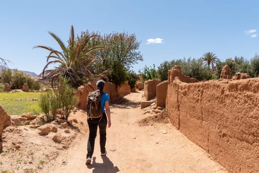 Hiking through the scenic Tafraoute valley in the Anti-Atlas mountains in Morocco