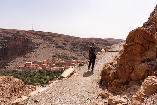 Hiking through the old Id Aissa agadir, an old granary in Amtoudi, Morocco