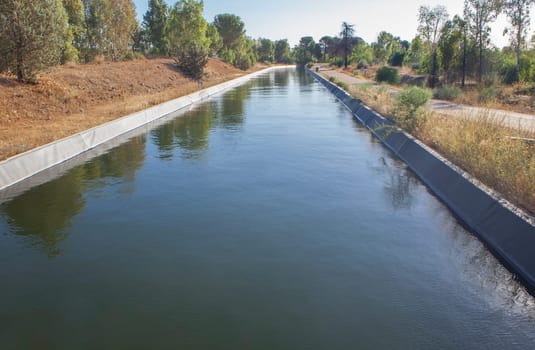 Orellana Irrigation canal crossing Vegas Altas del Guadiana, Badajoz, Extremadura, Spain