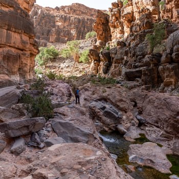 Hiking through the iconic Amtoudi canyon in the Anti-Atlas, Morocco