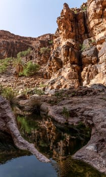 Hiking through the iconic Amtoudi canyon in the Anti-Atlas, Morocco