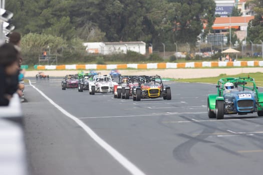 11-20-2022 PORTUGAL, LISBON: Caterham festival - racing karts driving on the track. Mid shot
