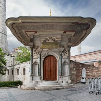 Entrance to Carpet Museum in Istanbul, Turkey, in the Sultanahmet neighborhood, few steps away from the Hagia Sophia. Entrance has a pointed arch and flanked by two columns with Corinthian capitals