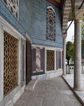 Exterior shot of Baghdad Kiosk, or Bagdat Kosku, located at the Fourth Courtyard of Topkapi Palace, decorated with floral blue mosaic tiles, Istanbul, Turkey