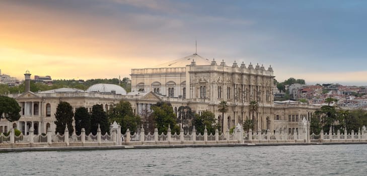 View from Bosporus strait of Dolmabahce Palace, or Dolmabahce Sarayi before sunset, located in Besiktas district on the European coast, Istanbul, Turkey