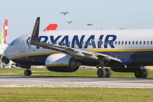 1 December 2022 PORTUGAL, LISBON: RYANAIR passenger plane rides on the runway. Mid shot