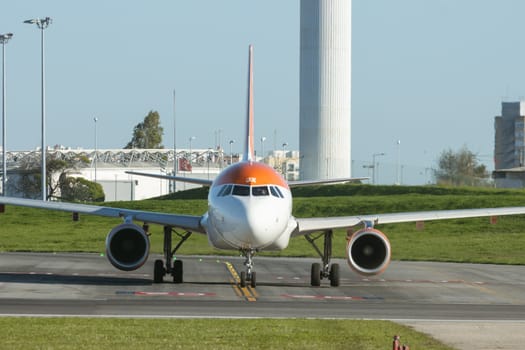 1 December 2022 PORTUGAL, LISBON: small JX aircraft standing on the airport field. Mid shot