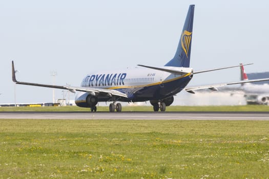 1 December 2022 PORTUGAL, LISBON: RYANAIR passenger plane on the runway. Mid shot
