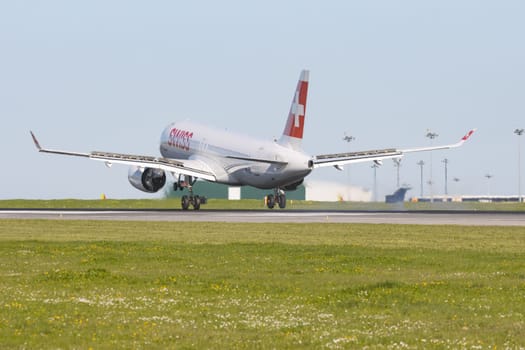 1 December 2022 PORTUGAL, LISBON: SWISS airlines passenger plane takes off the runway. Mid shot