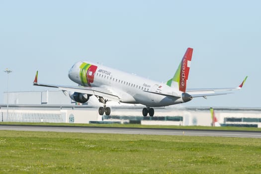 1 December 2022 PORTUGAL, LISBON: AIRPORTUGAL big passenger plane took off the runway. Mid shot