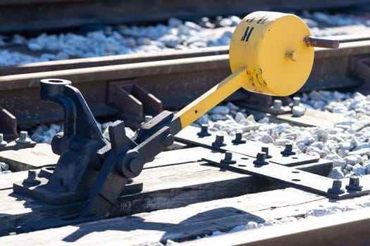 Hand switch lever next to the railway. Mid shot