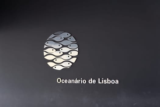 PORTUGAL, LISBON 12 December 2022: Lisbon Oceanarium logo on a black wall. Mid shot