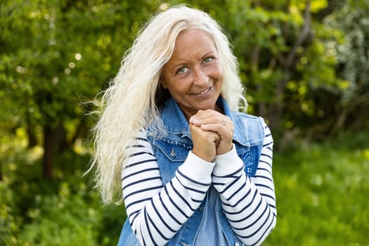 Portrait from happy caucasian woman with long hair