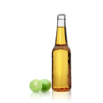 Beer bottle with lemon on white background