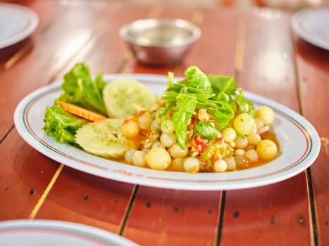 Giant catfish roe salad or Spicy Ryukyu fish roe salad.
