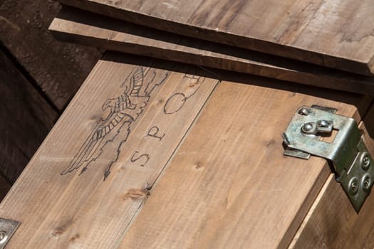 Camp wooden box for transport military supplies used by ancient roman army. SPQR symbol engraved