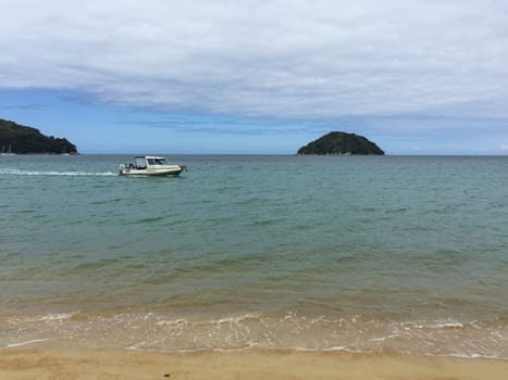 Motorboat at the coast of Abel Tasman National Park, New Zealand