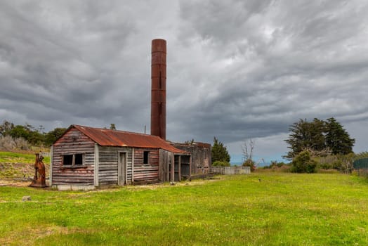 Old mining factory in the ghost town of Waiuta, South Island of New Zealand