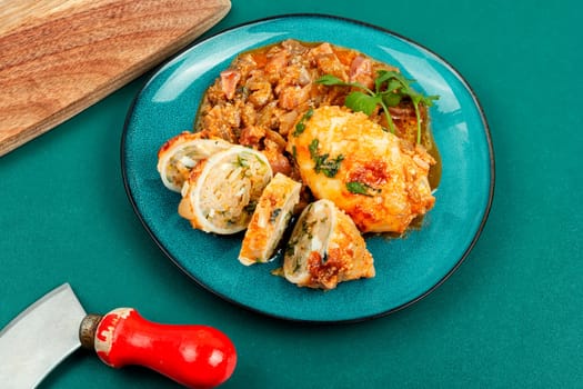 Baked clams, squid stuffed with rice and nettle.