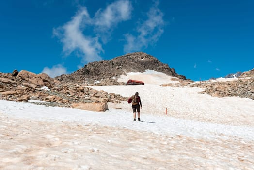 Hiking the last meters to the Mueller hut, Mount Oliver in the background, Aoraki National Park, South Island of New Zealand