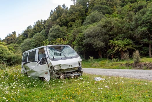 Destructed car after an accident on the road in Te Urewera National Park, New Zealand