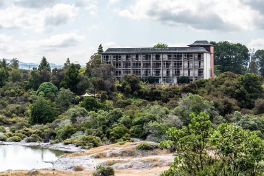 Old hotel ruin in Rotorua, abandoned through earthquake, North Island of New Zealand
