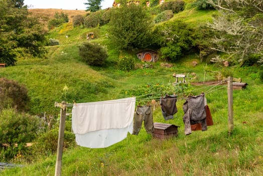 HOBBITON, NEW ZEALAND - JANUARY 20, 2023 - Famous Hobbiton village in Matamata from the movies The Hobbit and Lord of the Rings, New Zealand