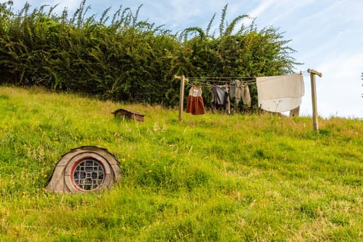 HOBBITON, NEW ZEALAND - JANUARY 20, 2023 - Famous Hobbiton village in Matamata from the movies The Hobbit and Lord of the Rings, New Zealand