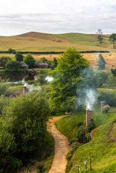 HOBBITON, NEW ZEALAND - JANUARY 20, 2023 - Famous Hobbiton village in Matamata from the movies The Hobbit and Lord of the Rings, New Zealand