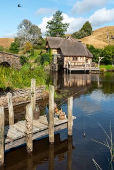HOBBITON, NEW ZEALAND - JANUARY 20, 2023 - Famous Hobbiton village in Matamata from the movies The Hobbit and Lord of the Rings, New Zealand