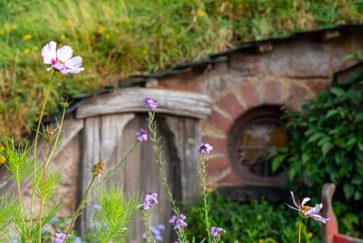 HOBBITON, NEW ZEALAND - JANUARY 20, 2023 - Famous Hobbiton village in Matamata from the movies The Hobbit and Lord of the Rings, New Zealand