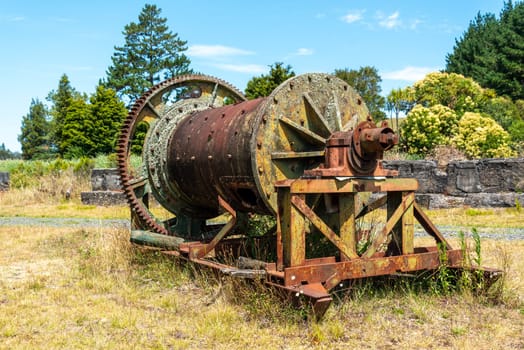 Old machines in deserted stamping battery in Karangahake, Coromandel peninsula in New Zealand