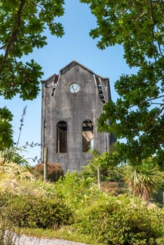 Old tall industrial building at Waihi gold mine in New Zealand