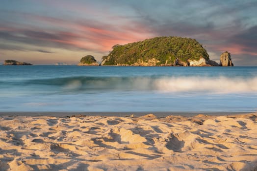 Scenic view of an island at the beach of Great Barrier Island, North Island of New Zealand