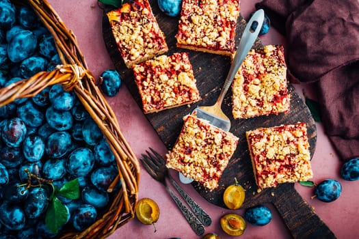 Homemade vegan German plum cake (Zwetschgenkuchen) with yeast dough and crumbles